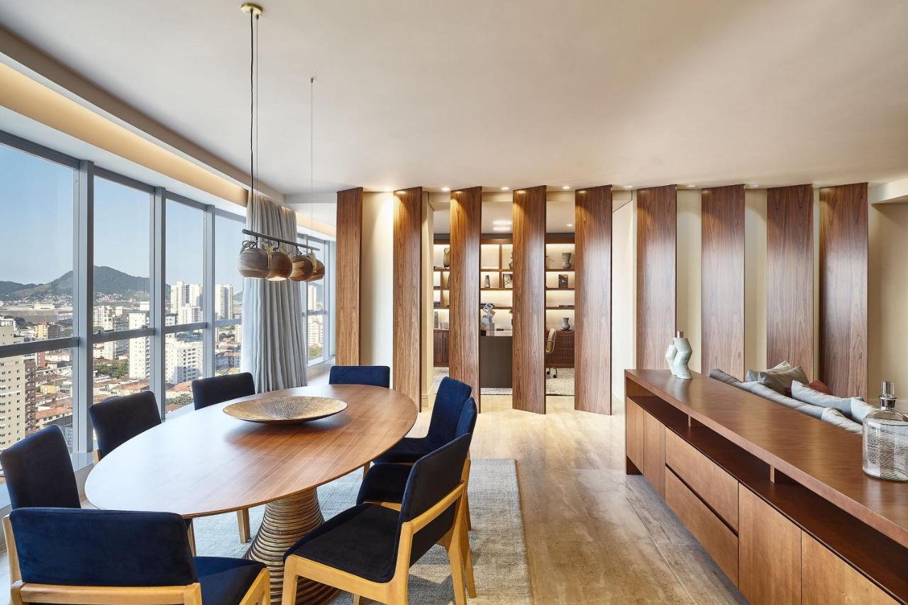 喜来登桑托斯酒店 外观 照片 The dining room of a three-bedroom apartment