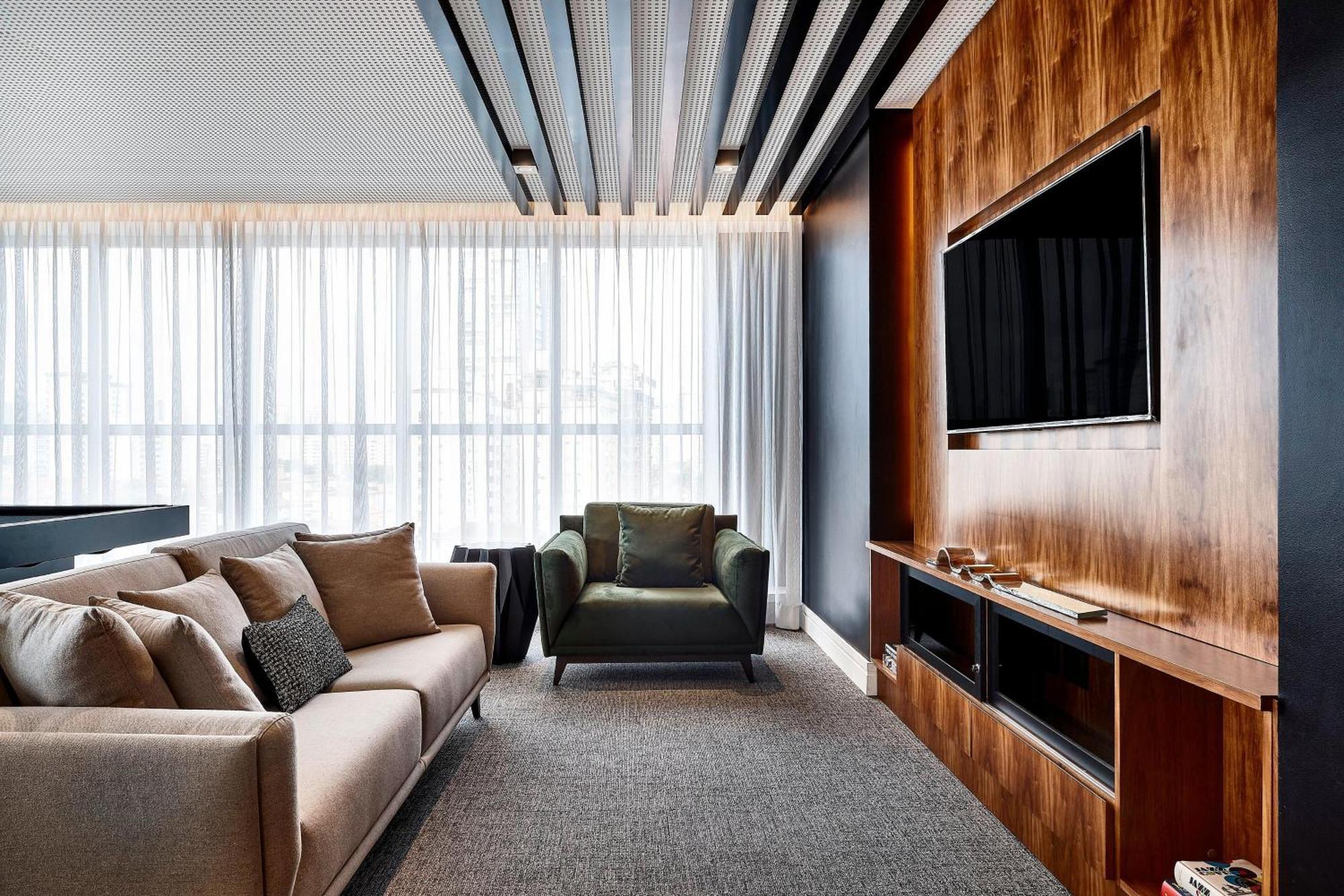 喜来登桑托斯酒店 外观 照片 A living room with a television